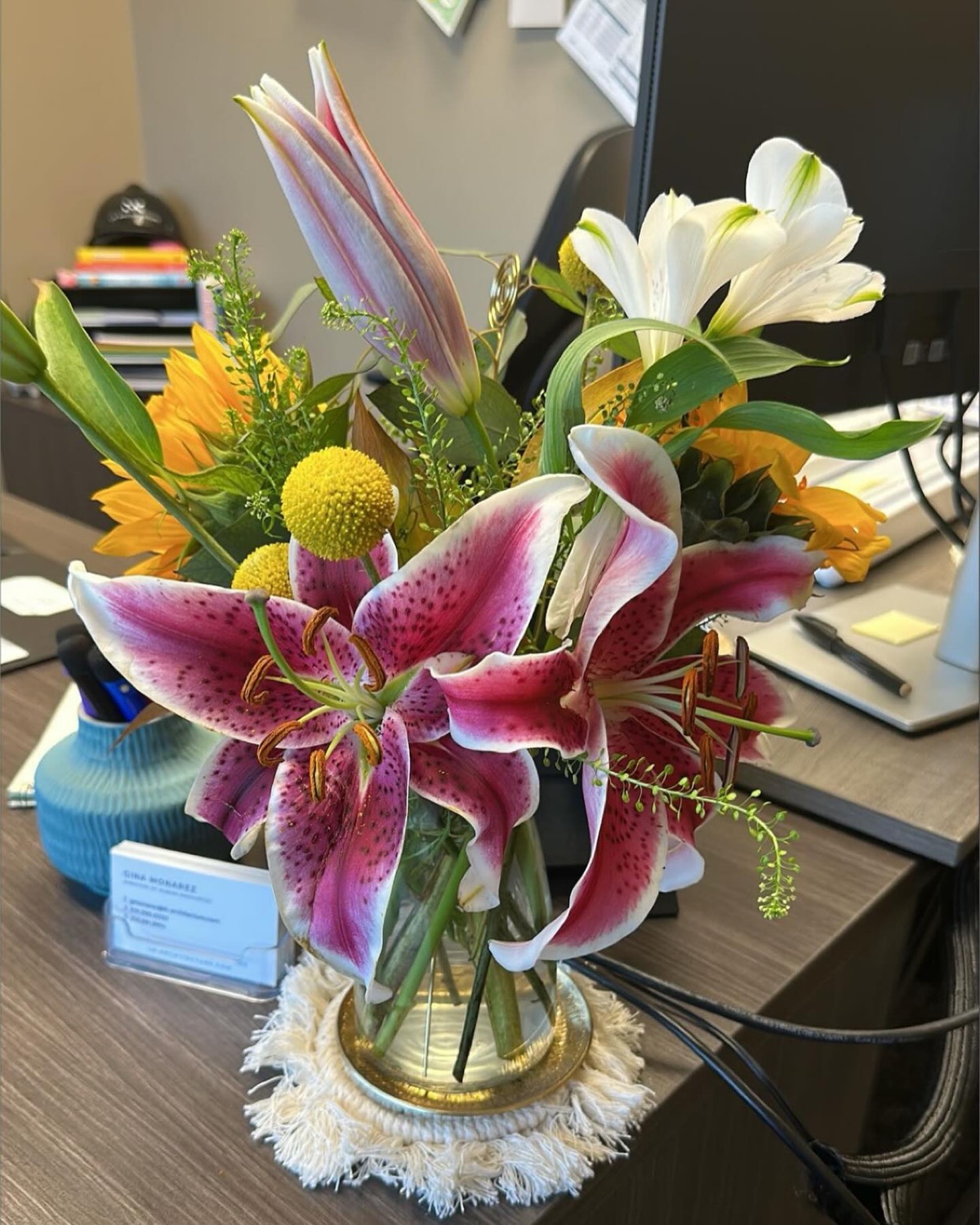 Lily and sunflower arrangement by Sie & Mo